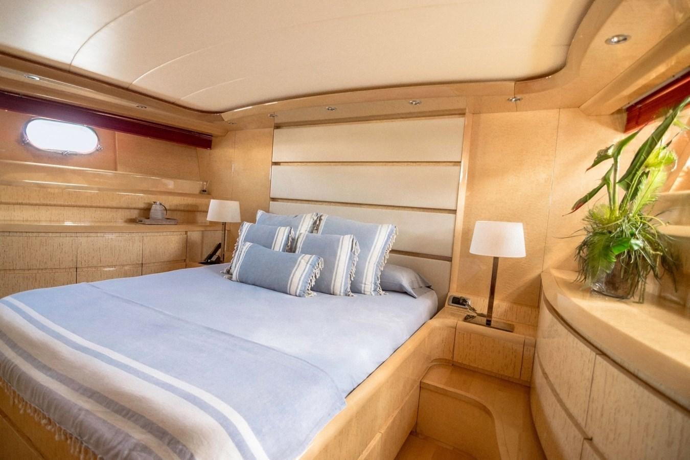 a bed in a room aboard ROSIQUE Yacht for Sale