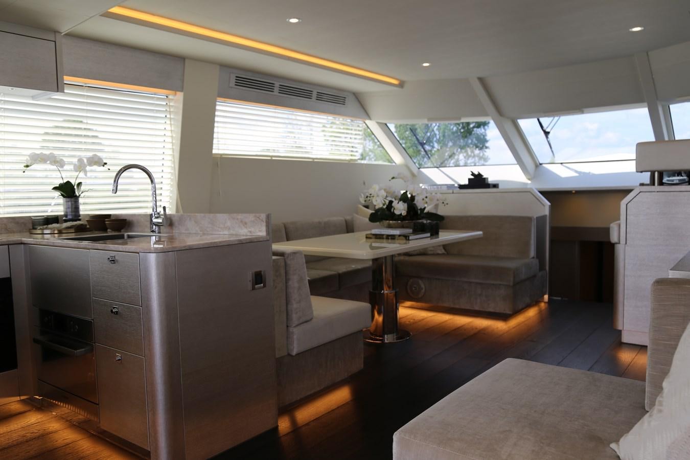 a kitchen with a large island aboard ALILEA Yacht for Sale