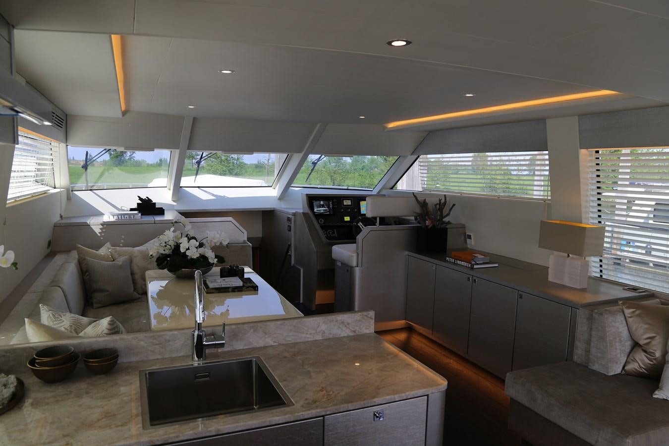 a kitchen with a large island aboard ALILEA Yacht for Sale