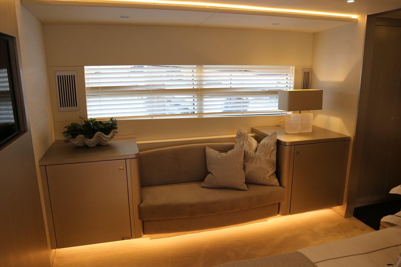 a couch in a room aboard ALILEA Yacht for Sale