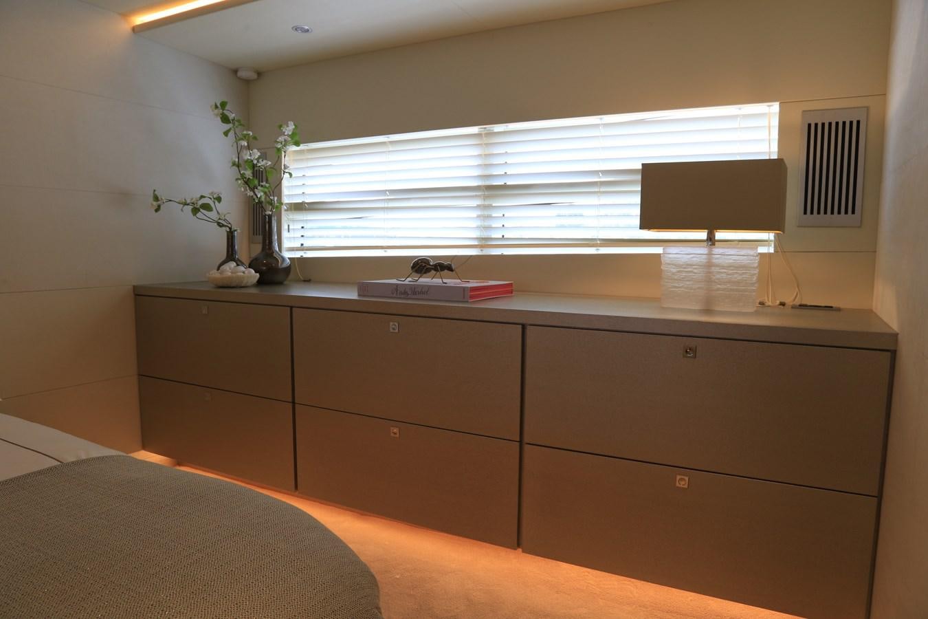 a room with a desk and a window aboard ALILEA Yacht for Sale