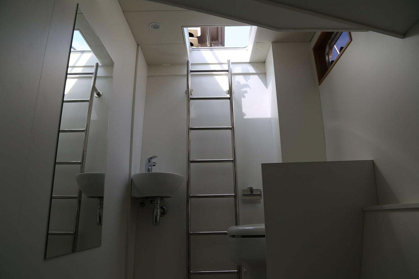 a bathroom with a glass shower aboard ALILEA Yacht for Sale