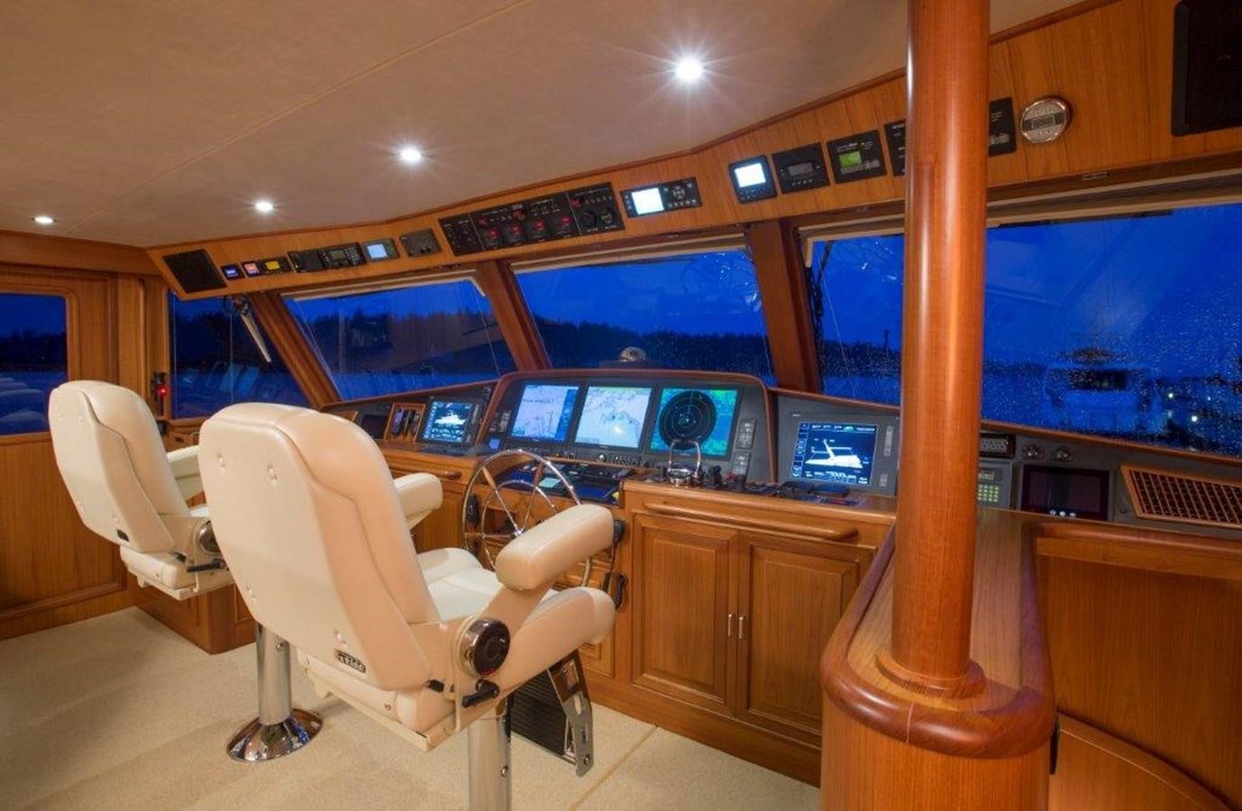 a room with a desk and chairs aboard FLEMING 78 - NEW BUILD Yacht for Sale