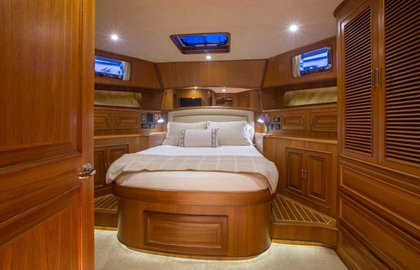 a bed in a room aboard FLEMING 78 - NEW BUILD Yacht for Sale