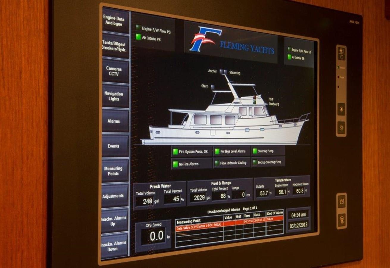 a black computer monitor aboard FLEMING 78 - NEW BUILD Yacht for Sale