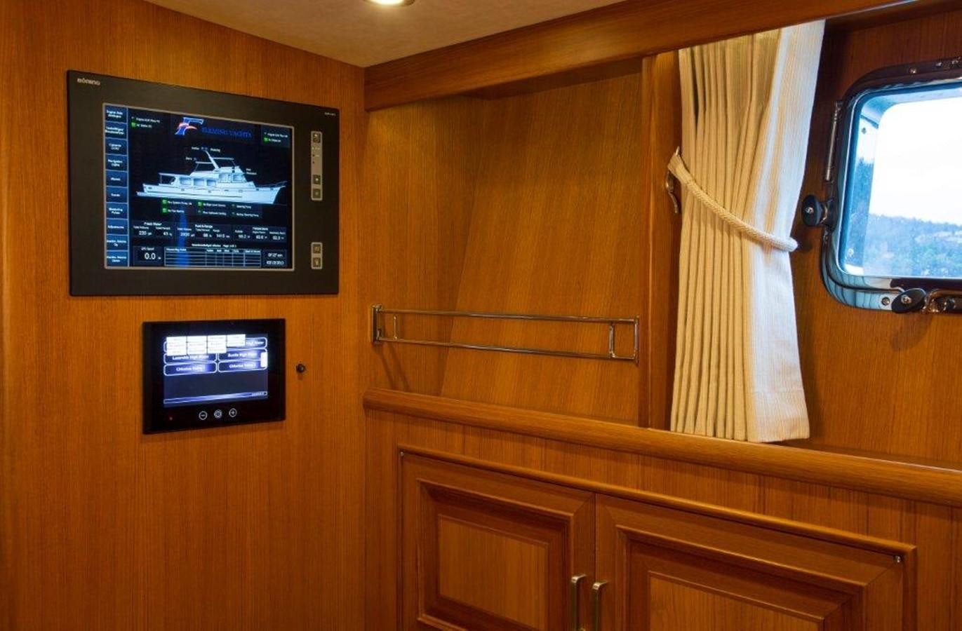 a tv on a wall aboard FLEMING 78 - NEW BUILD Yacht for Sale