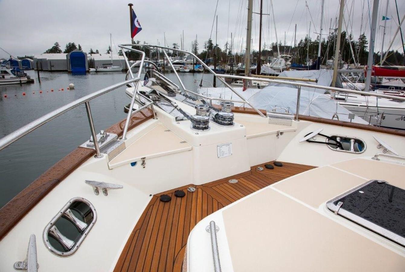 a boat in a harbor aboard FLEMING 78 - NEW BUILD Yacht for Sale