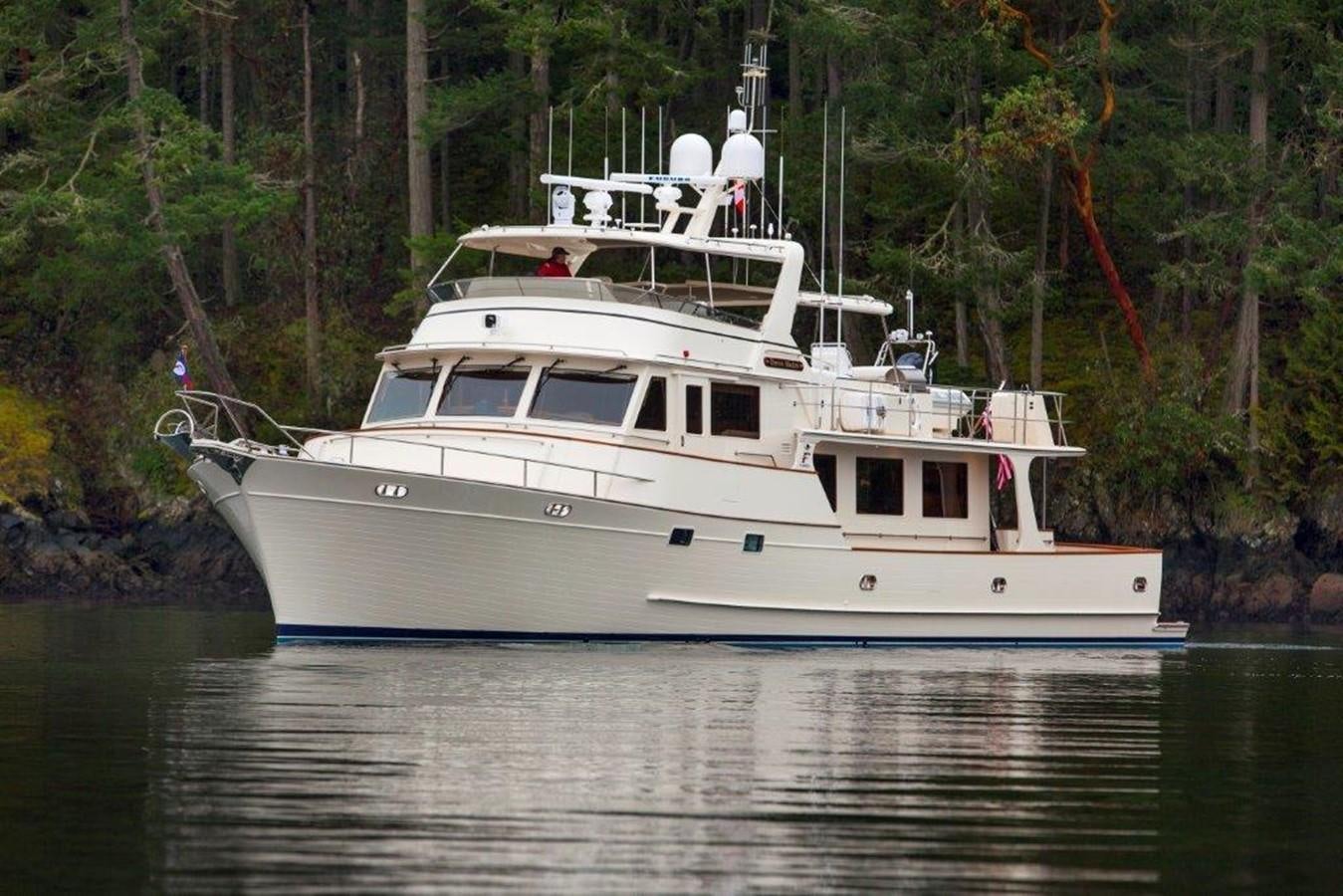a white boat in the water aboard FLEMING 78 - NEW BUILD Yacht for Sale