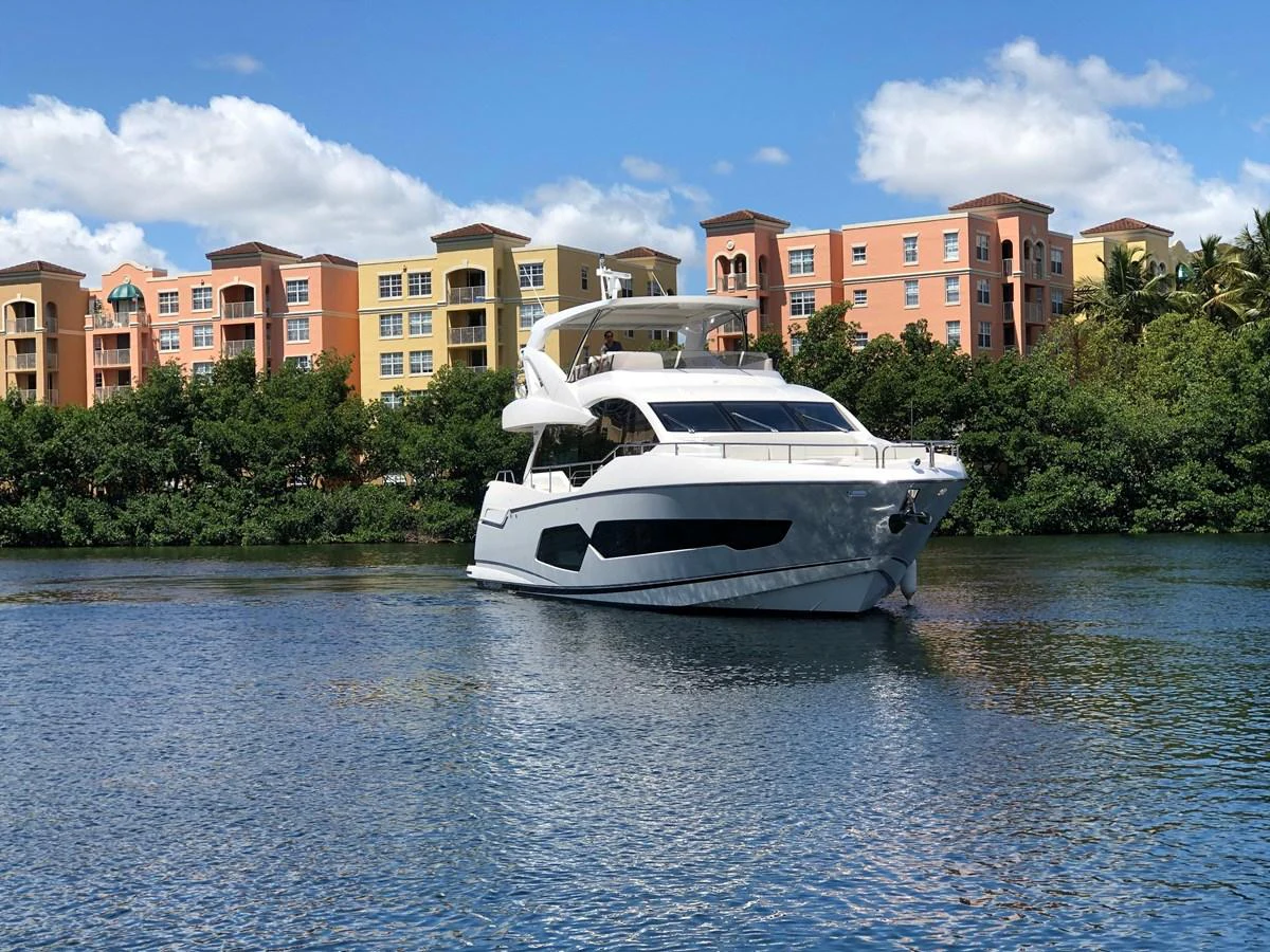 a white yacht in the water aboard SOLAIRE Yacht for Sale