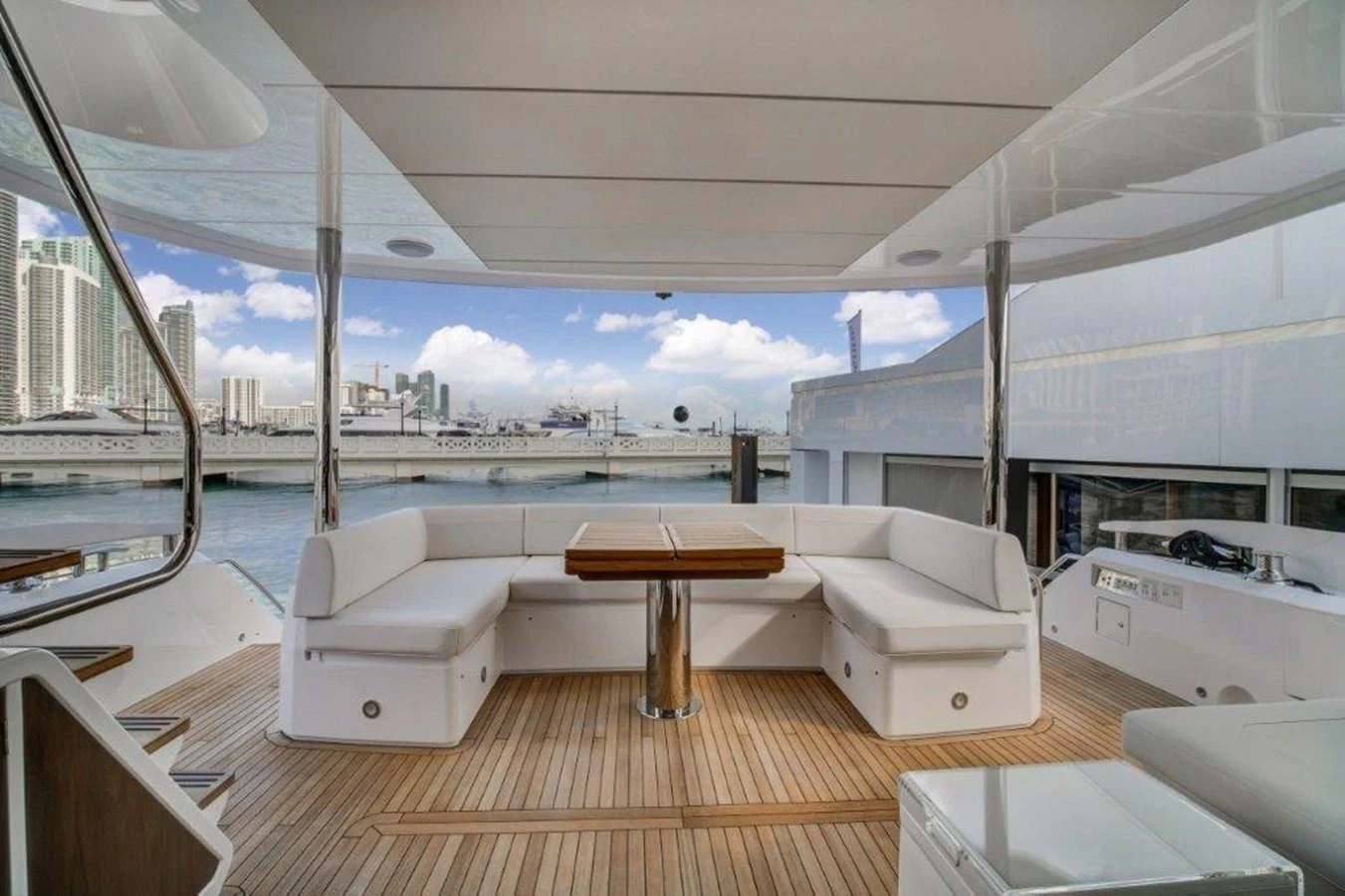 a room with a table and chairs aboard SOLAIRE Yacht for Sale