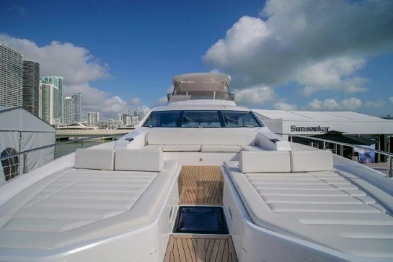 a white car parked outside a building aboard SOLAIRE Yacht for Sale