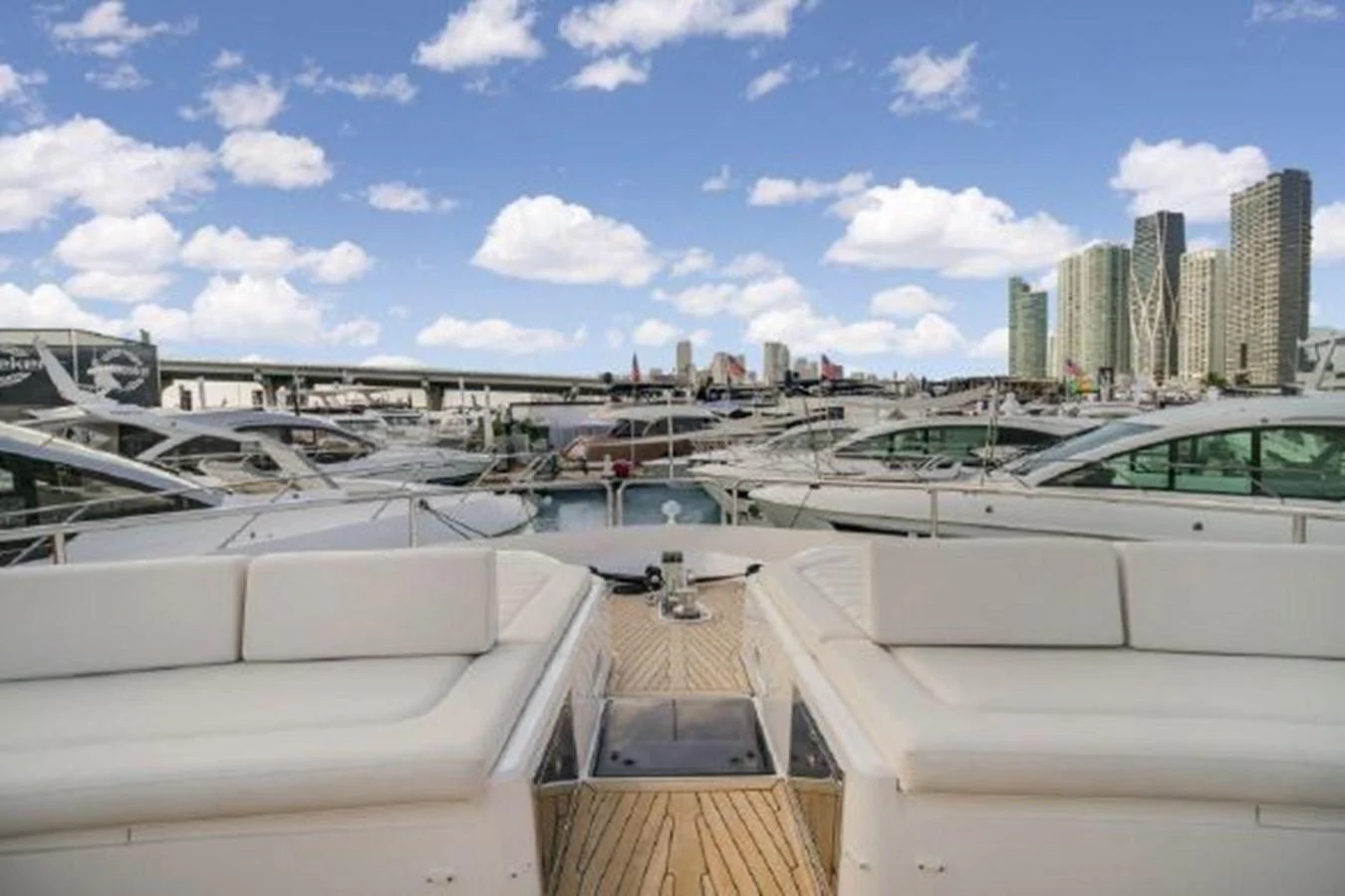 a deck with a view of a city and a body of water aboard SOLAIRE Yacht for Sale