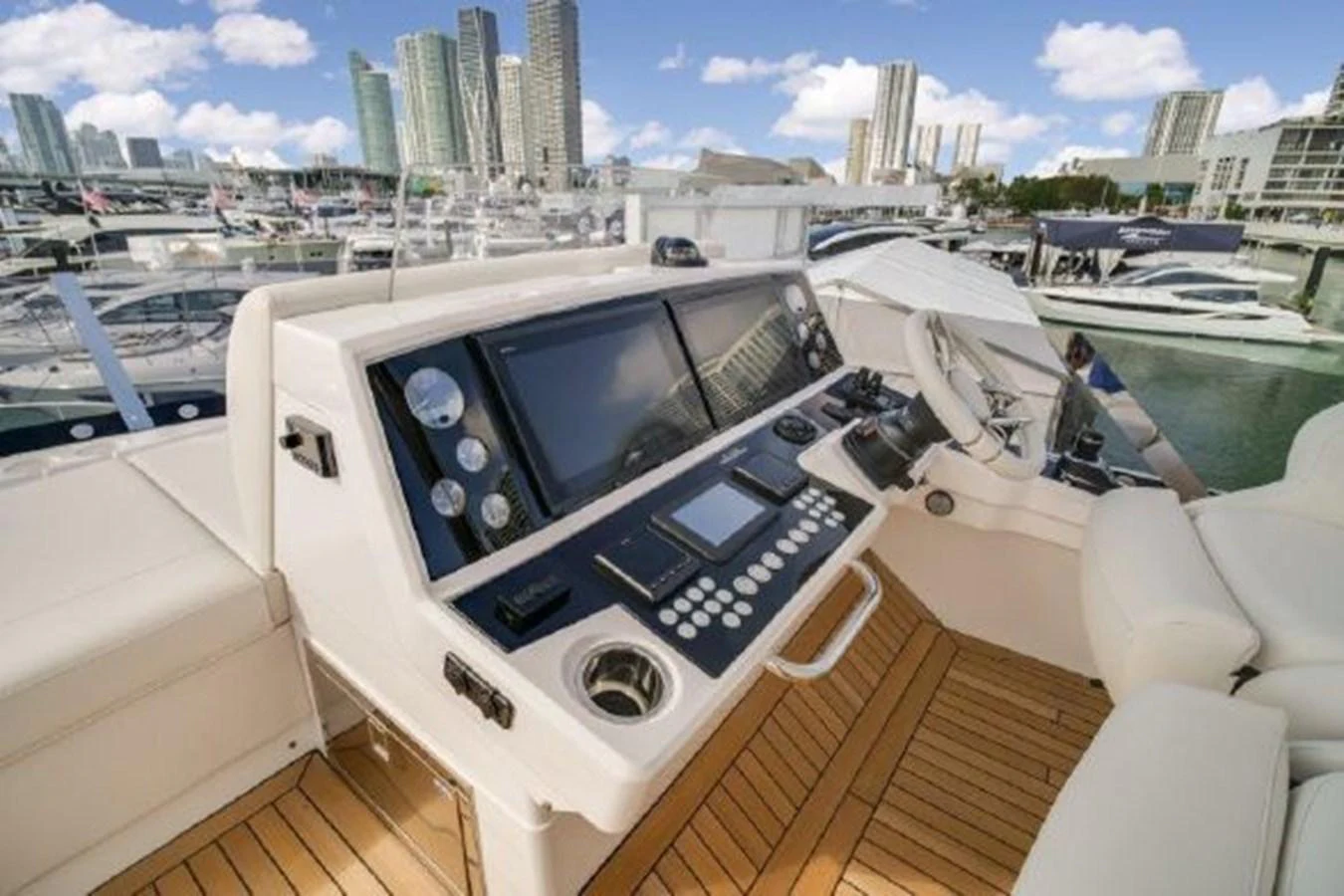 a white yacht on a deck aboard SOLAIRE Yacht for Sale