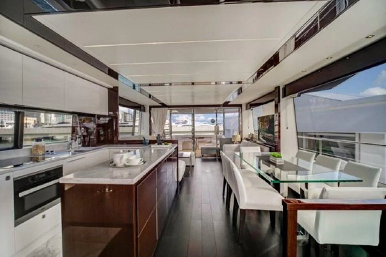 a kitchen with a large window aboard SOLAIRE Yacht for Sale