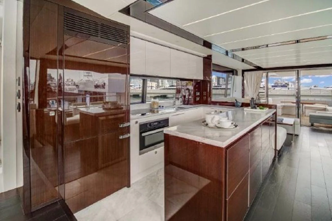 a kitchen with a large glass door aboard SOLAIRE Yacht for Sale