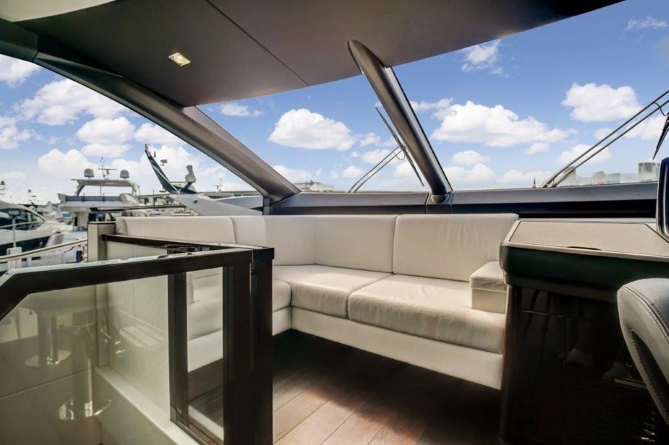 a white couch on a boat aboard SOLAIRE Yacht for Sale