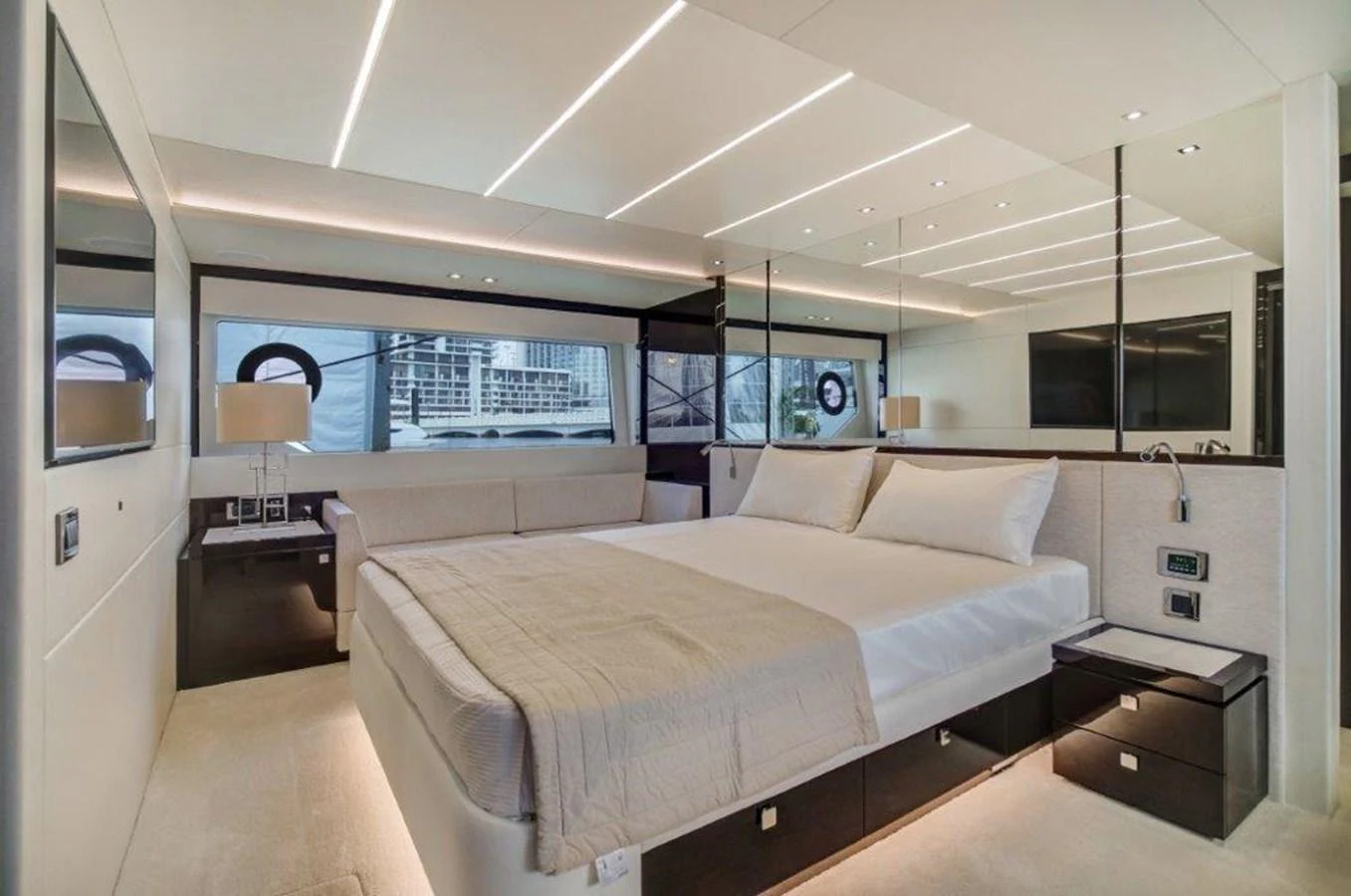 a room with a bed and a desk aboard SOLAIRE Yacht for Sale