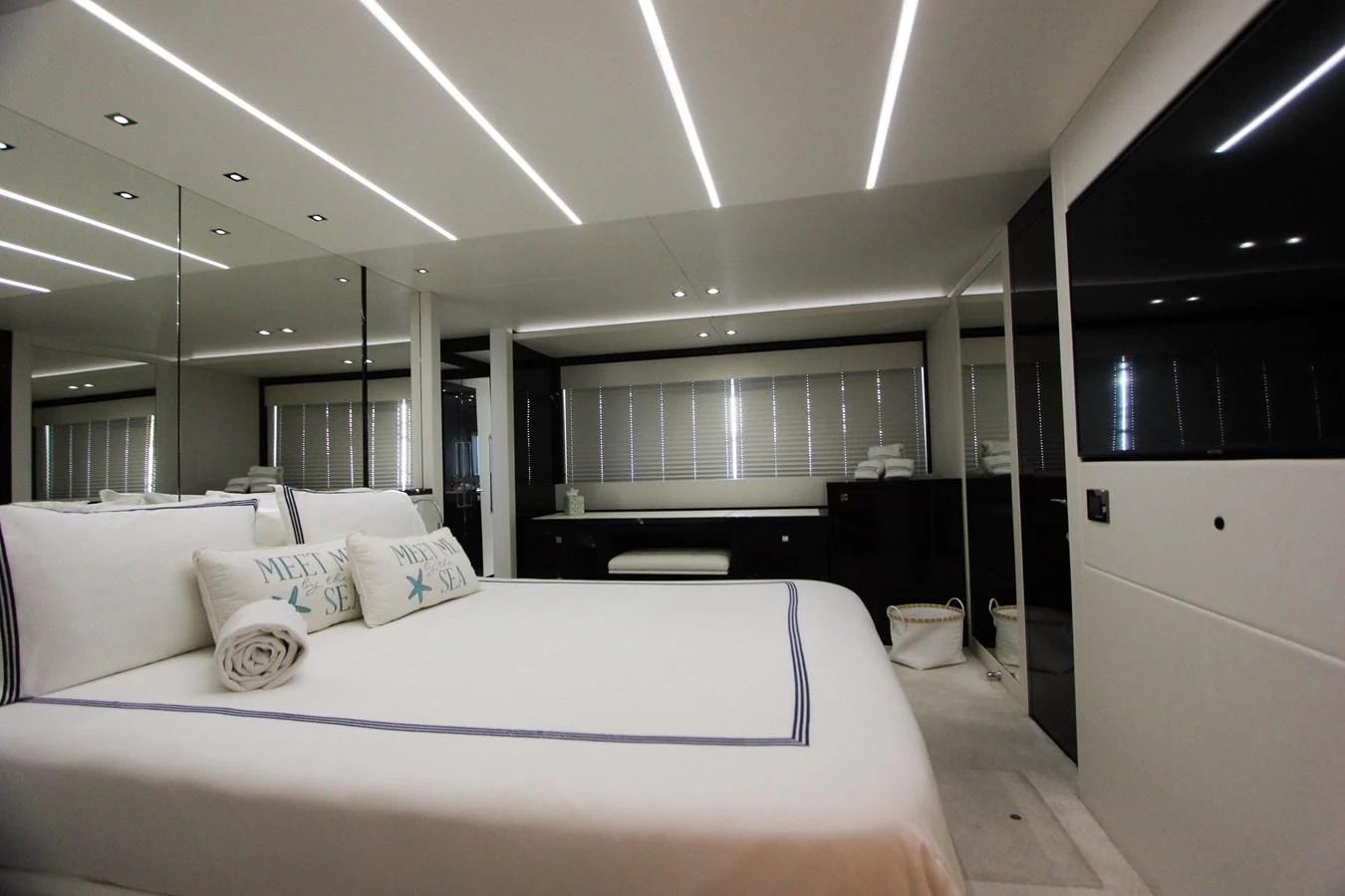 a large bed in a room aboard SOLAIRE Yacht for Sale