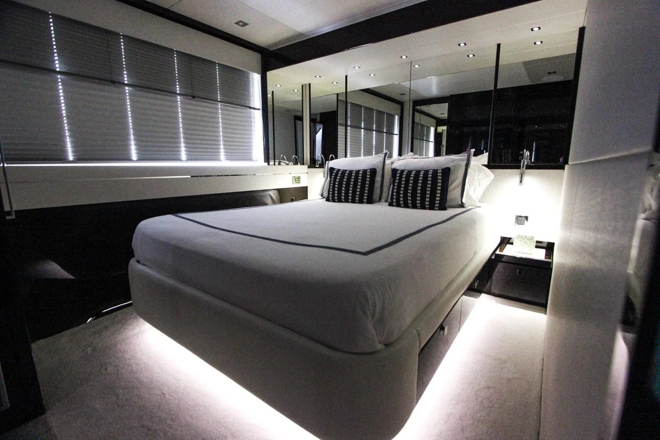a bed in a room aboard SOLAIRE Yacht for Sale