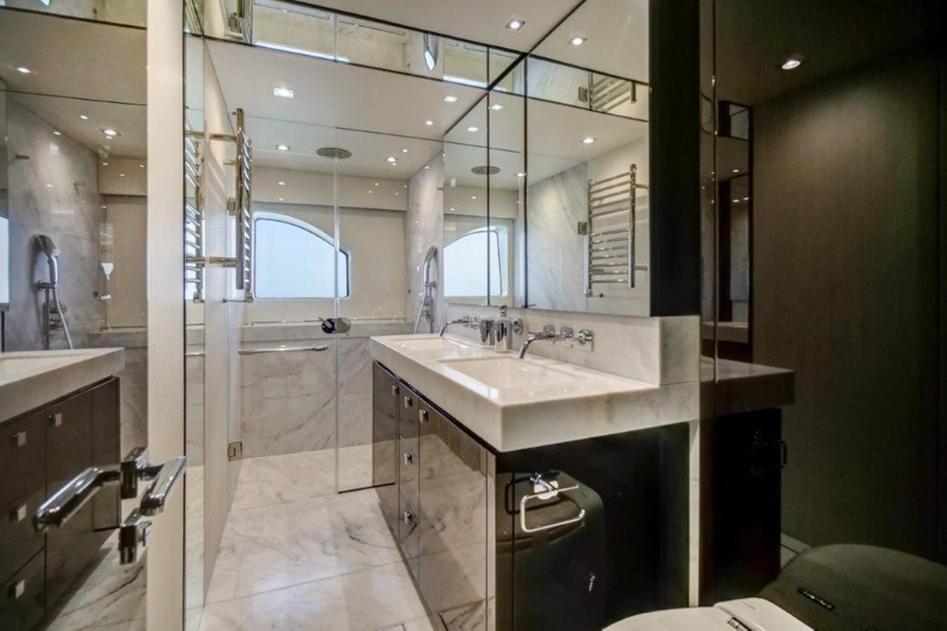a bathroom with a sink and a mirror aboard SOLAIRE Yacht for Sale
