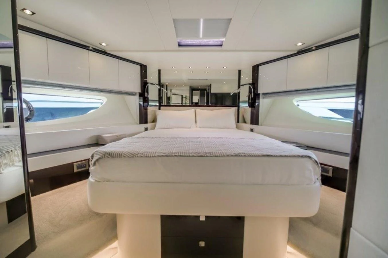 a bed in a room aboard SOLAIRE Yacht for Sale