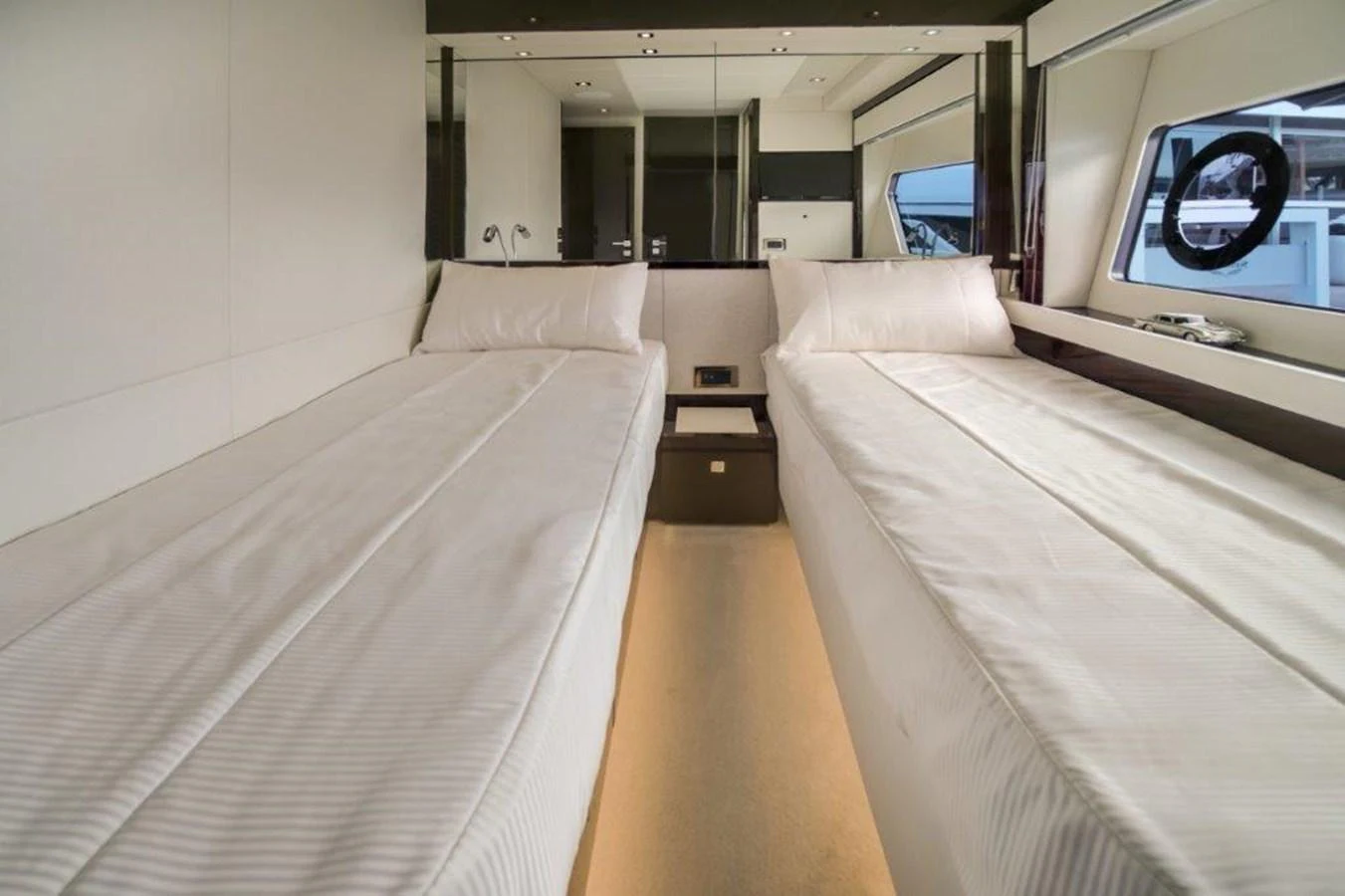 a room with a bed and a tv aboard SOLAIRE Yacht for Sale