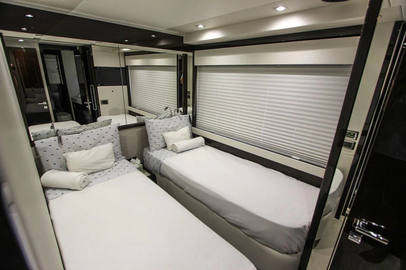 a room with two beds aboard SOLAIRE Yacht for Sale