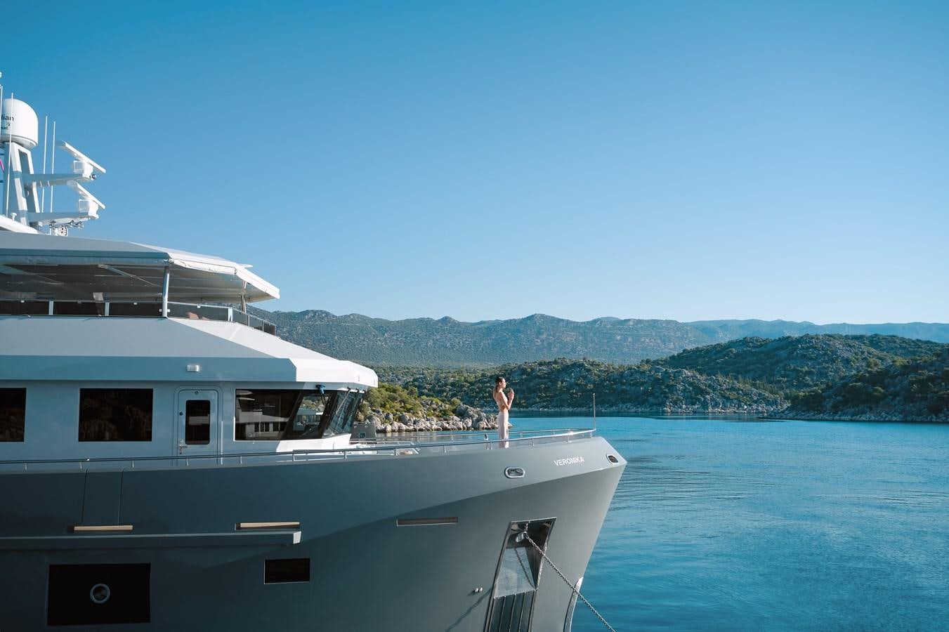 a person standing on a boat aboard BERING 88/05 Yacht for Sale