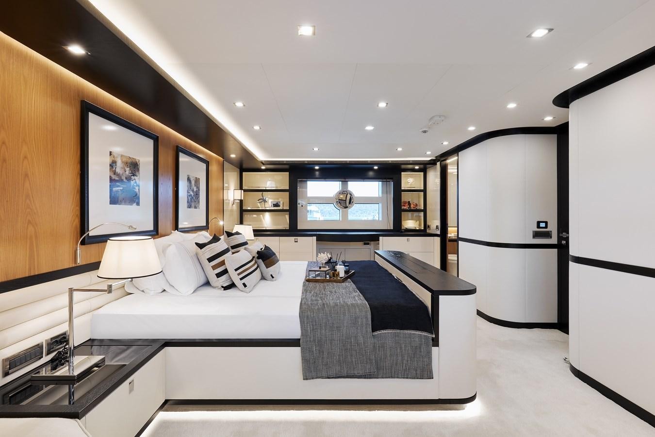 a large bedroom with a large bed aboard BERING 88/05 Yacht for Sale
