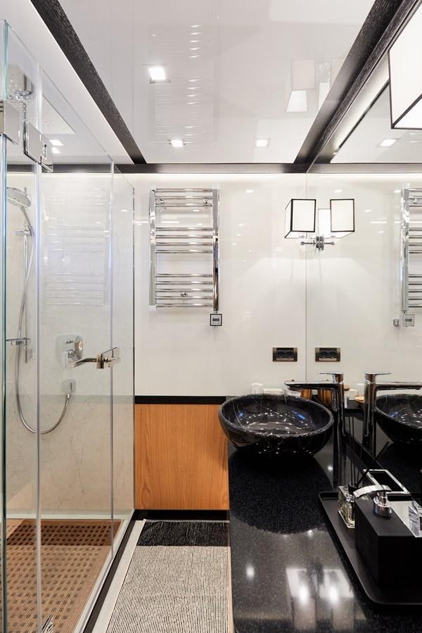 a bathroom with a large tub aboard BERING 88/05 Yacht for Sale