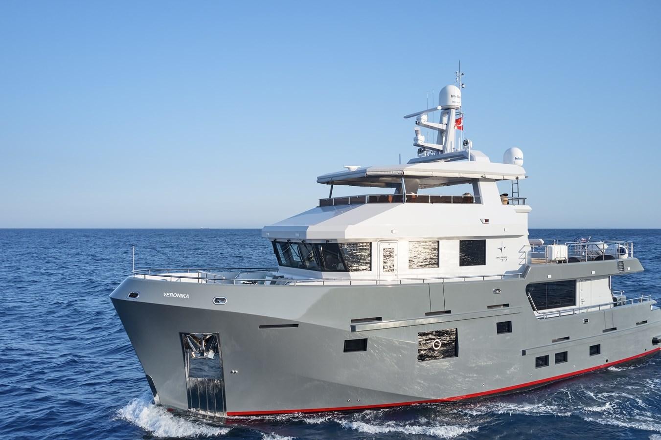 a large white boat in the water aboard BERING 88/05 Yacht for Sale