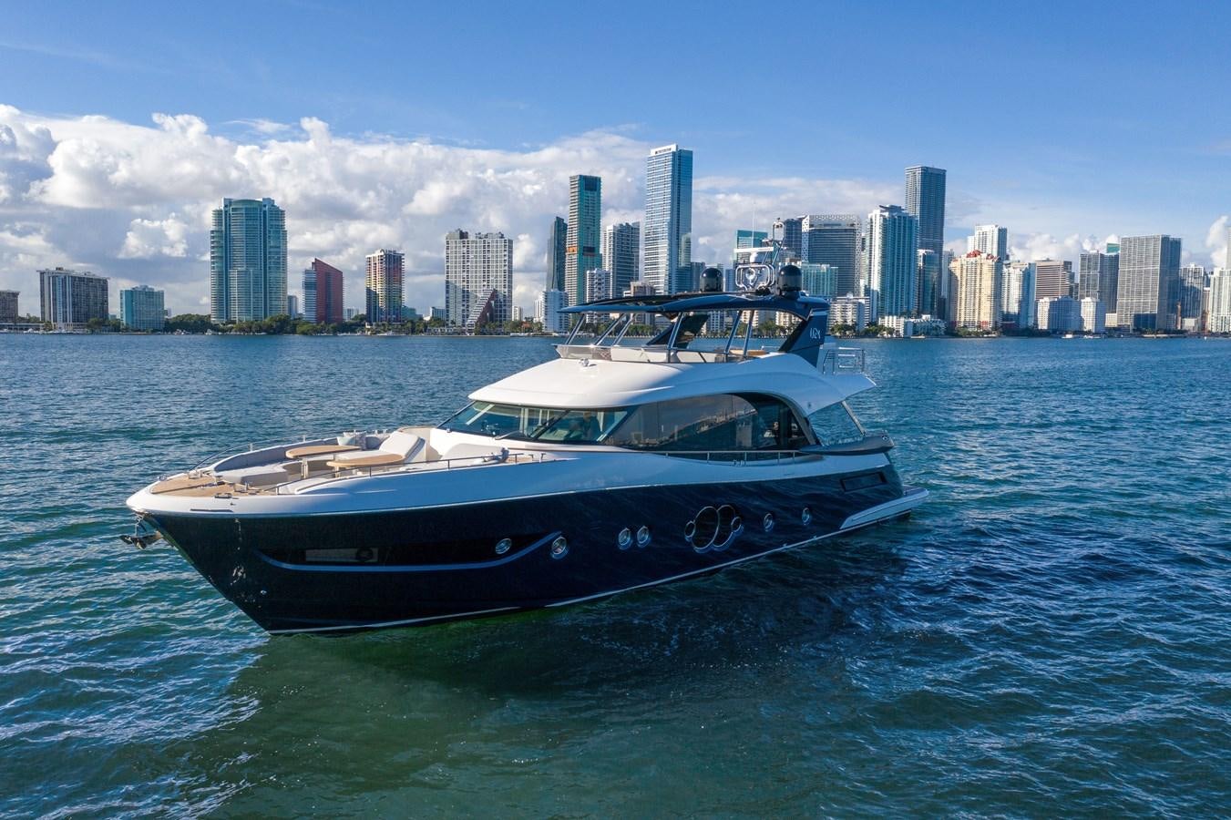 a boat on the water aboard MONTE CARLO YACHTS MCY 76 Yacht for Sale