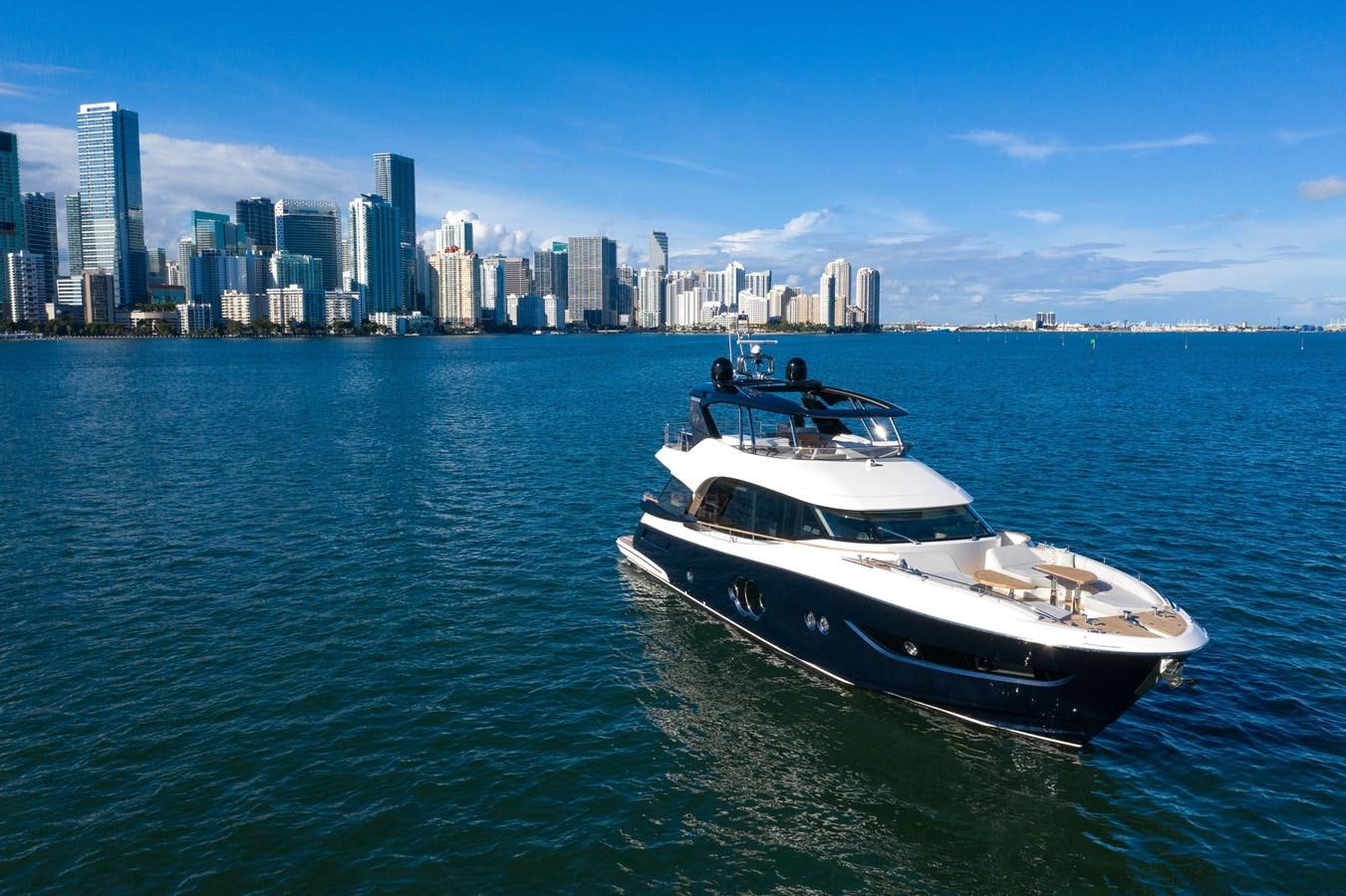 a boat in the water aboard MONTE CARLO YACHTS MCY 76 Yacht for Sale