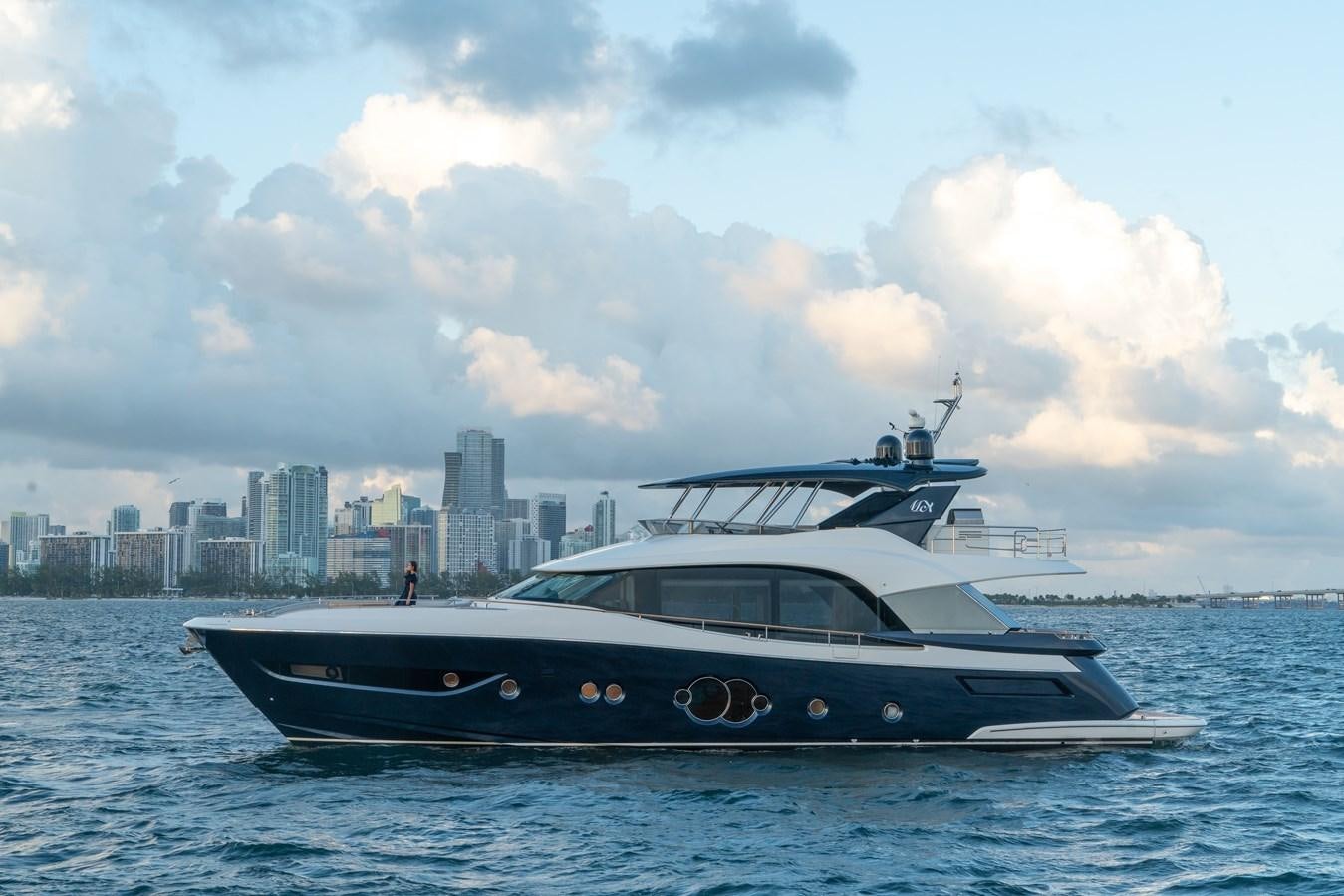 a boat in the water aboard MONTE CARLO YACHTS MCY 76 Yacht for Sale