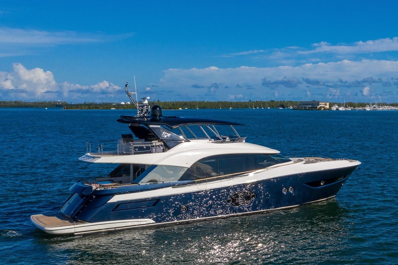 a boat on the water aboard MONTE CARLO YACHTS MCY 76 Yacht for Sale