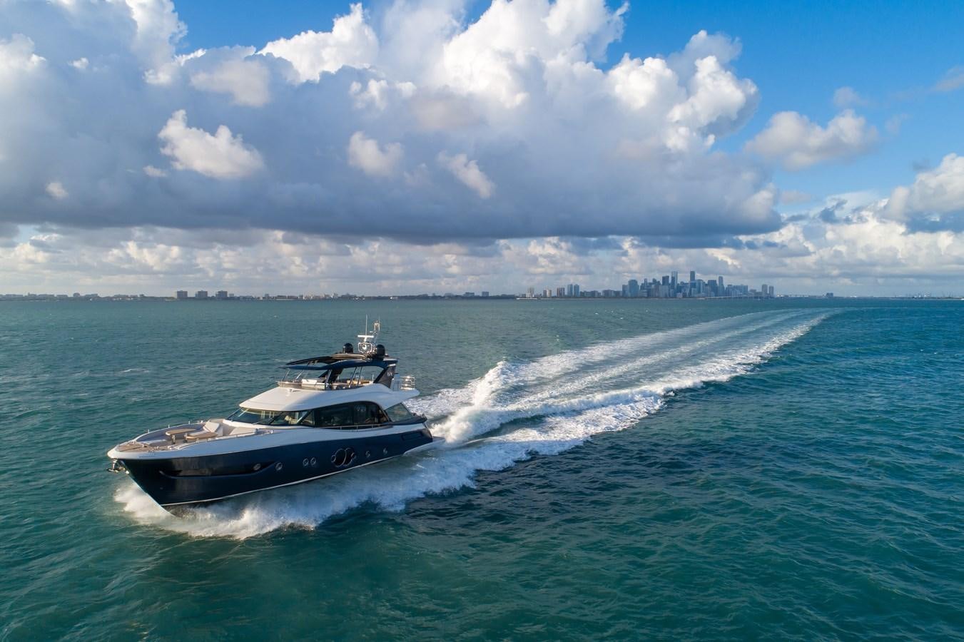 a boat on the water aboard MONTE CARLO YACHTS MCY 76 Yacht for Sale