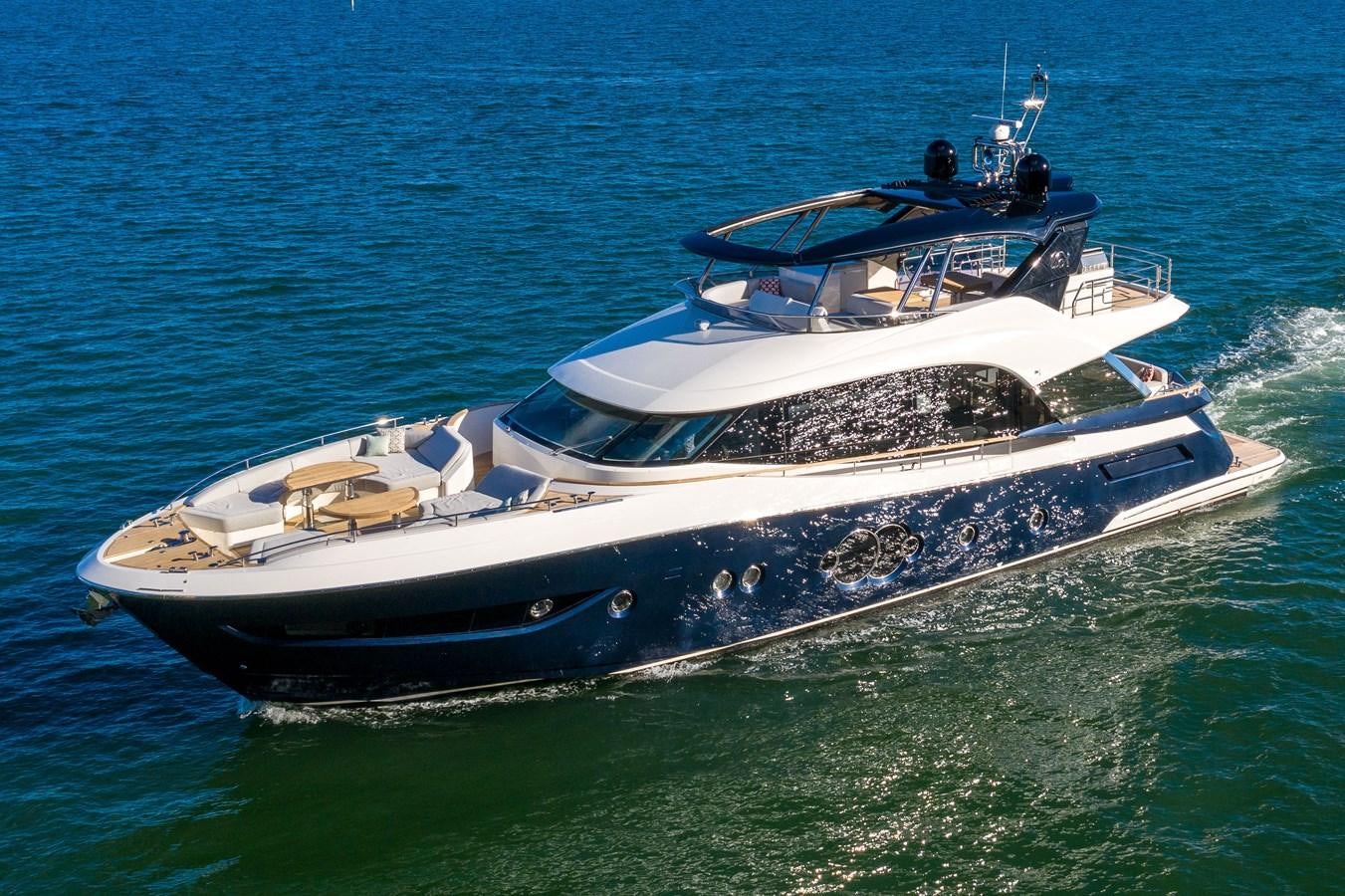 a boat on the water aboard MONTE CARLO YACHTS MCY 76 Yacht for Sale