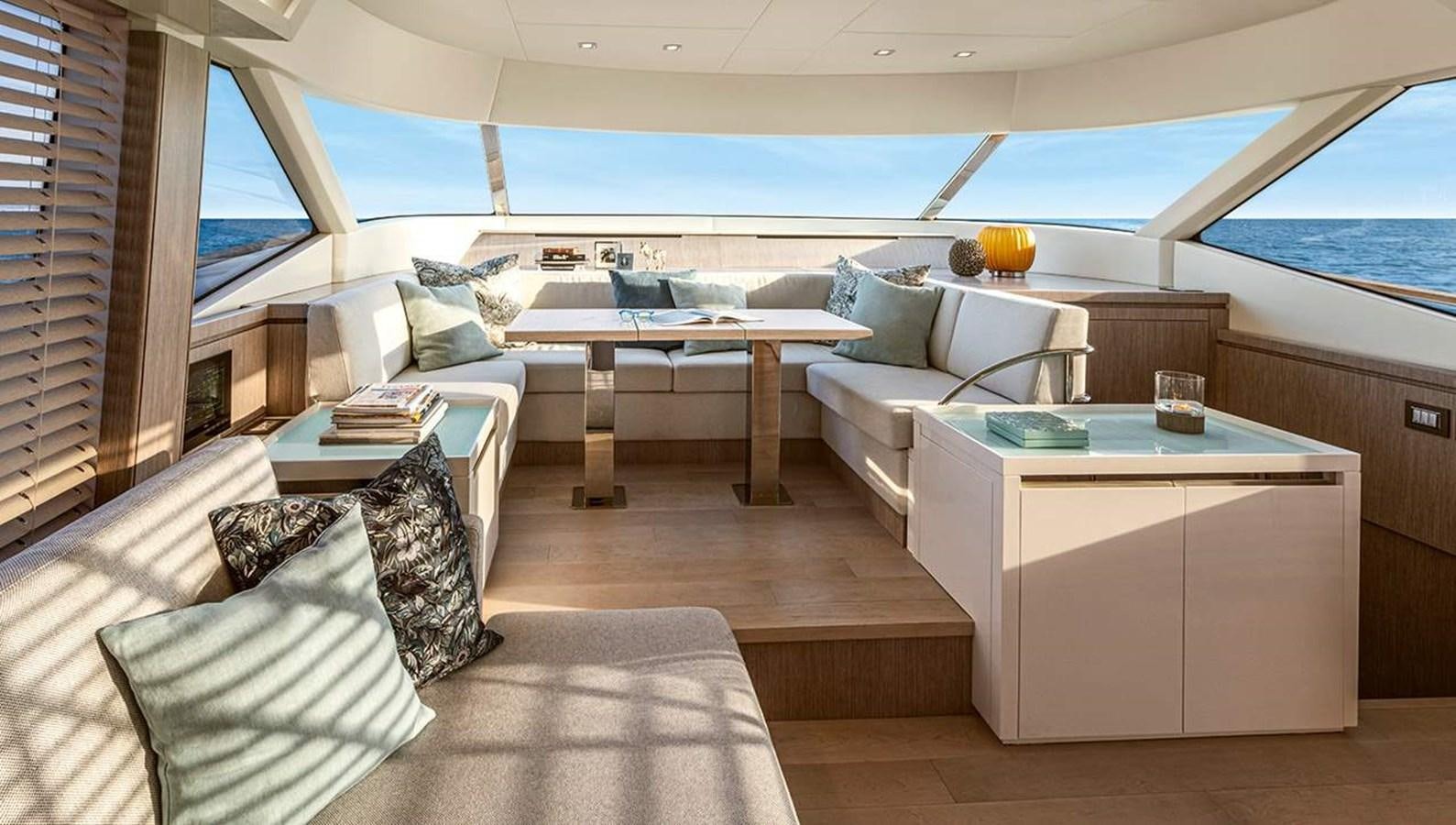 a living room with a couch and a table aboard MONTE CARLO SKYLOUNGE  Yacht for Sale