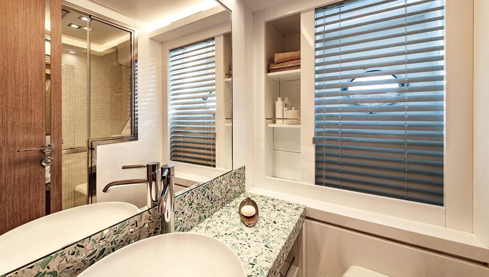 a bathroom with a marble counter top aboard MONTE CARLO SKYLOUNGE  Yacht for Sale