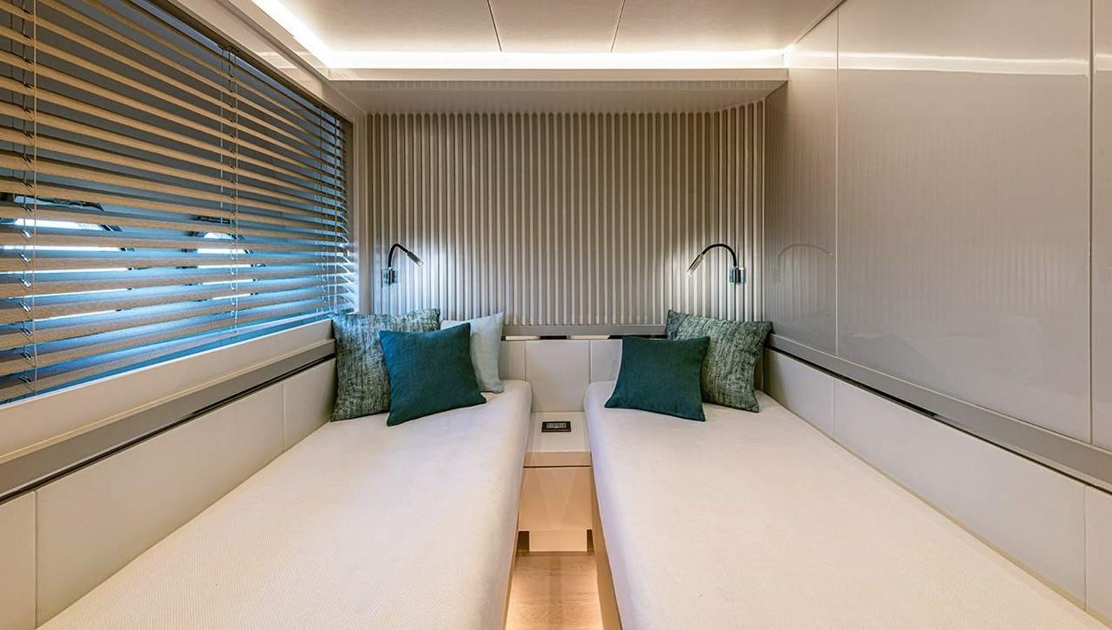 a room with a bed and a window aboard MONTE CARLO SKYLOUNGE  Yacht for Sale