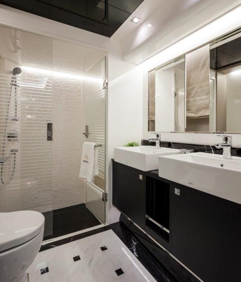 a bathroom with a sink and a toilet aboard V72 (NEW BOAT SPEC)  Yacht for Sale