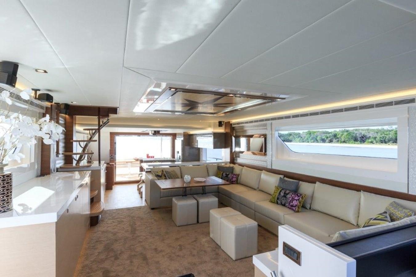 a living room with a large window aboard V72 (NEW BOAT SPEC)  Yacht for Sale