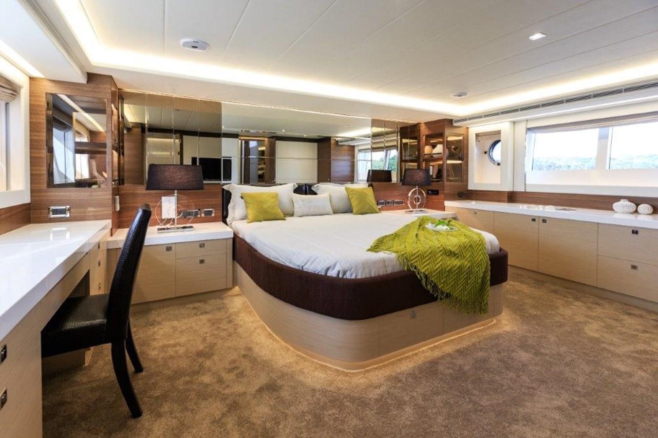 a bedroom with a bed and desk aboard V72 (NEW BOAT SPEC)  Yacht for Sale
