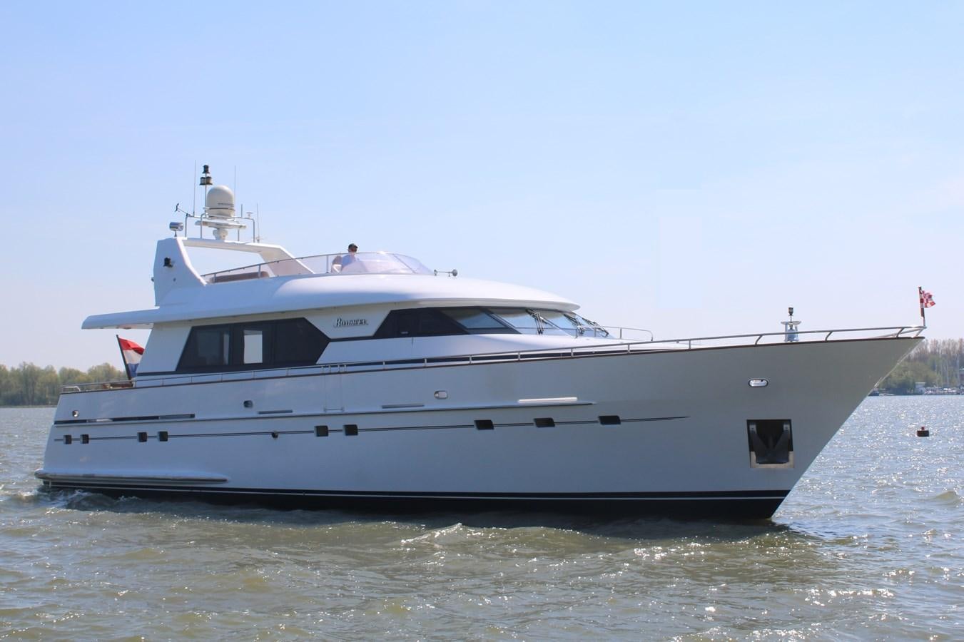 a white yacht on the water aboard BOADICEA Yacht for Sale