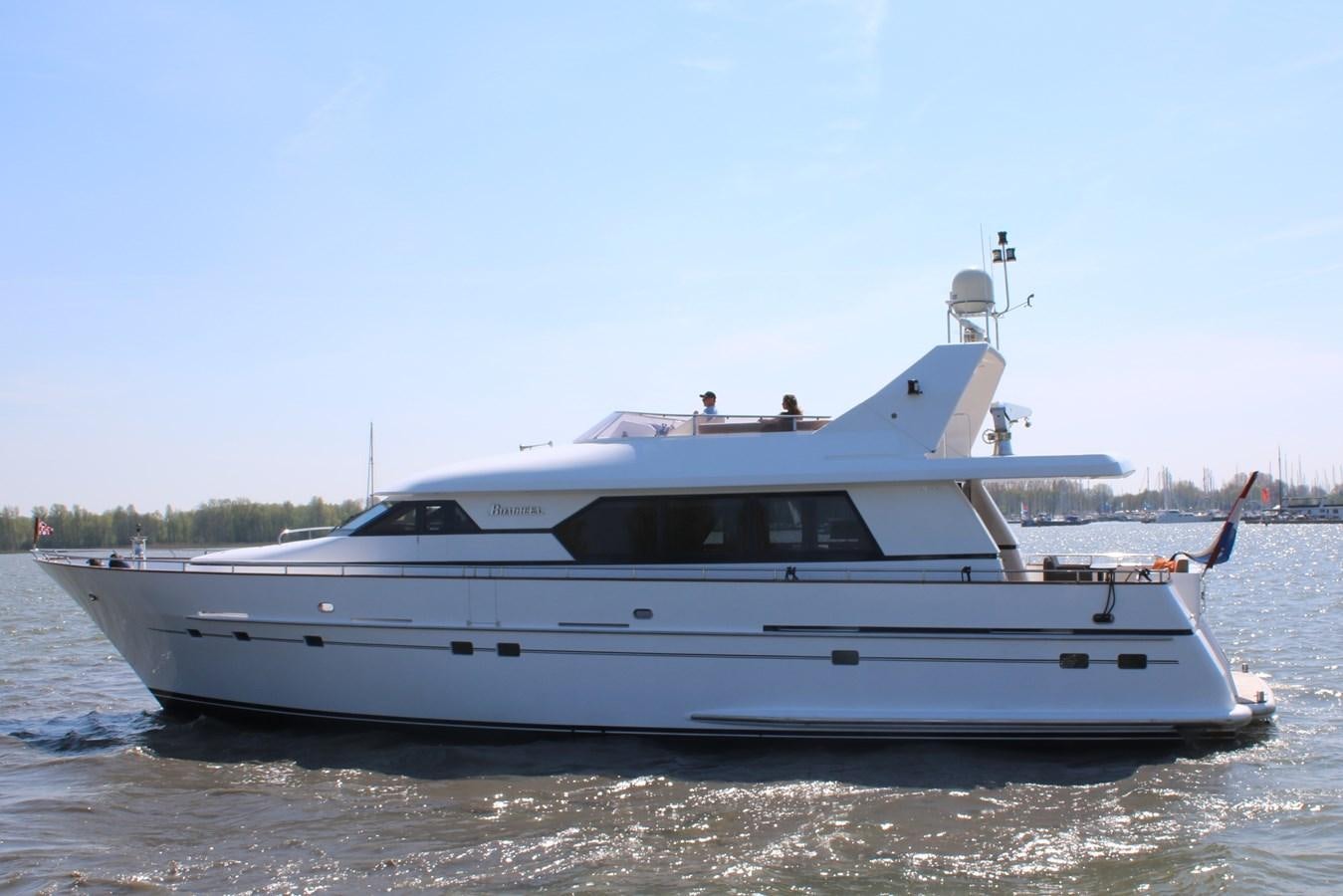 a white yacht on the water aboard BOADICEA Yacht for Sale