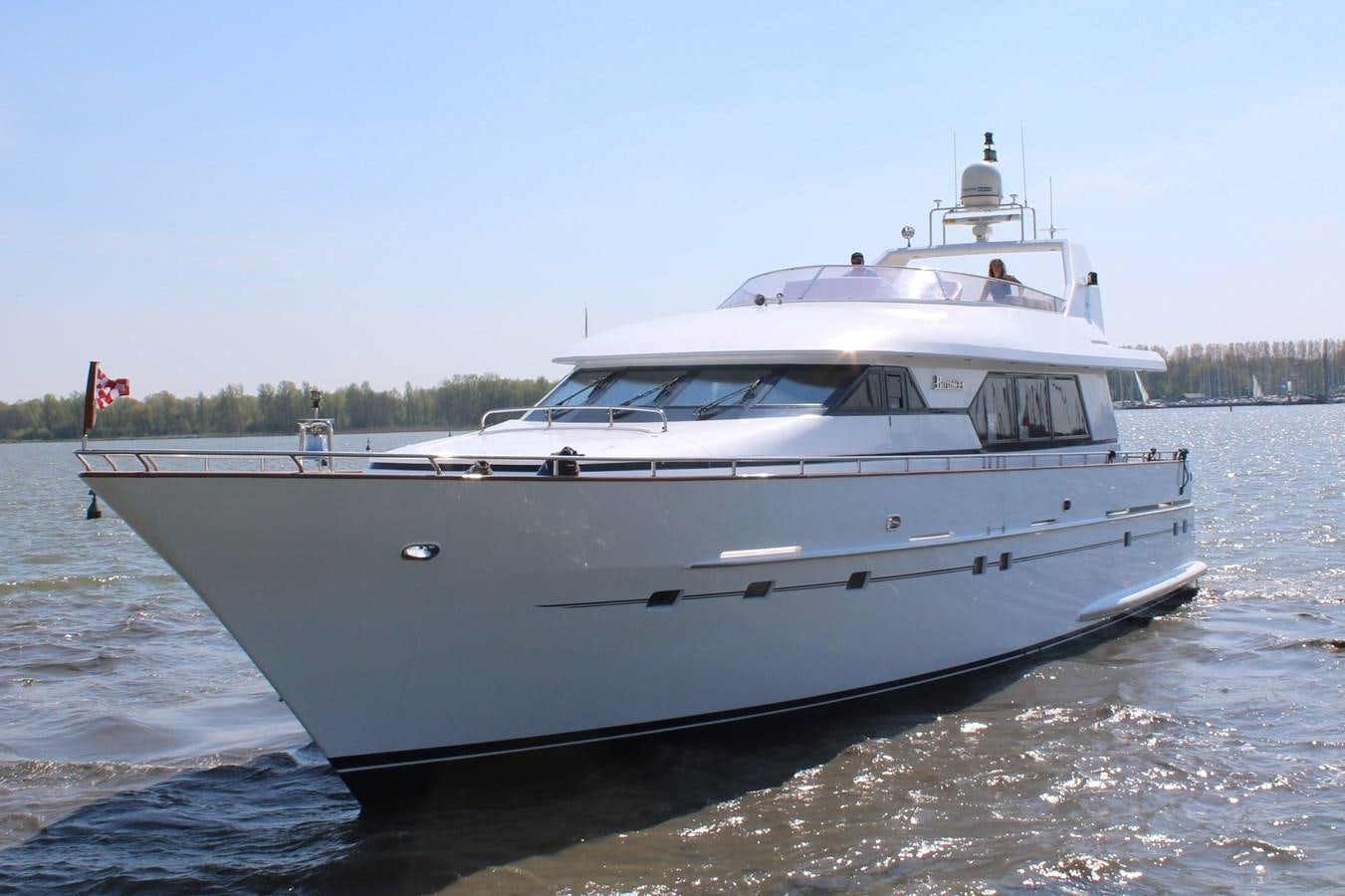 a white boat on the water aboard BOADICEA Yacht for Sale
