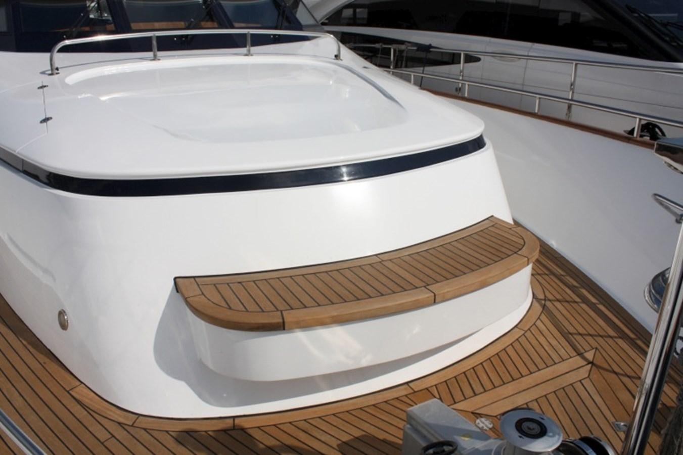 a white round object on a wooden surface aboard BOADICEA Yacht for Sale