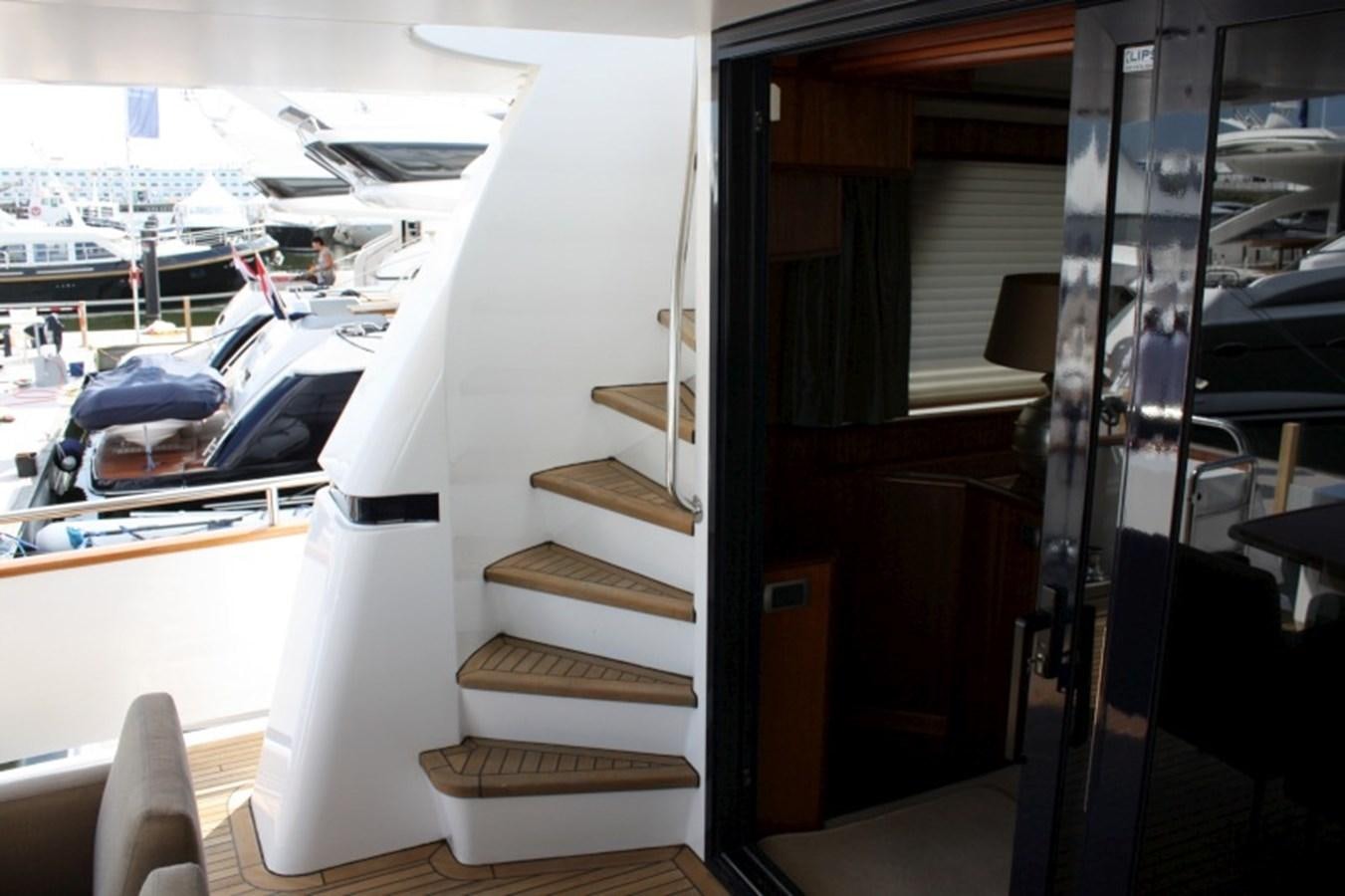 a white staircase in a boat aboard BOADICEA Yacht for Sale