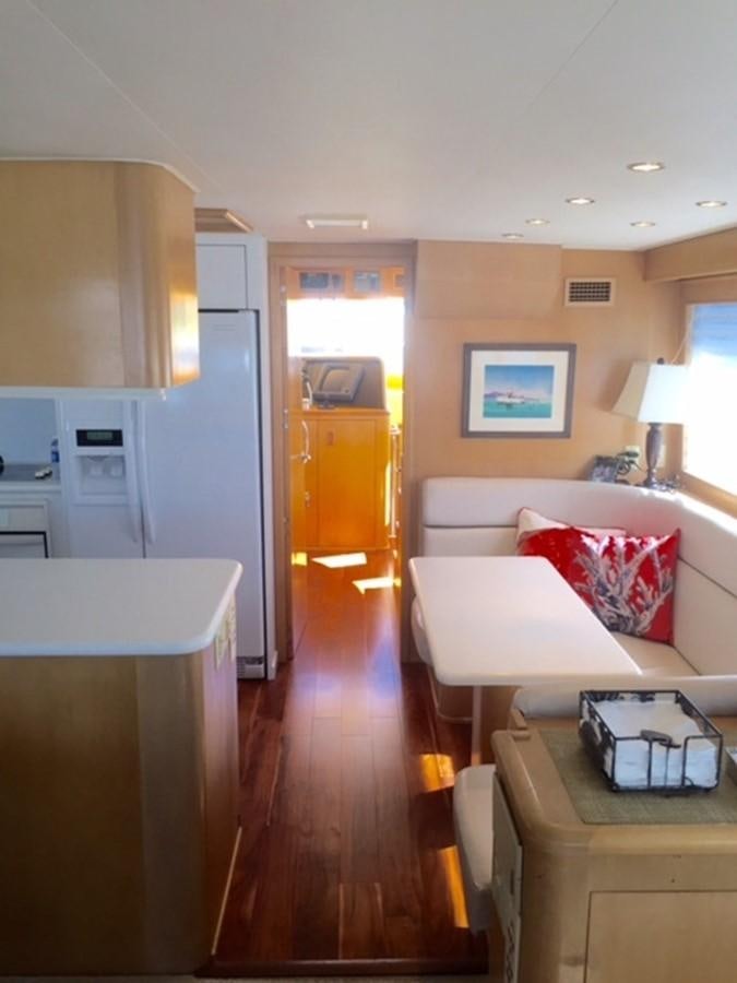 a living room with a couch and a table aboard WHALE'S WAY Yacht for Sale