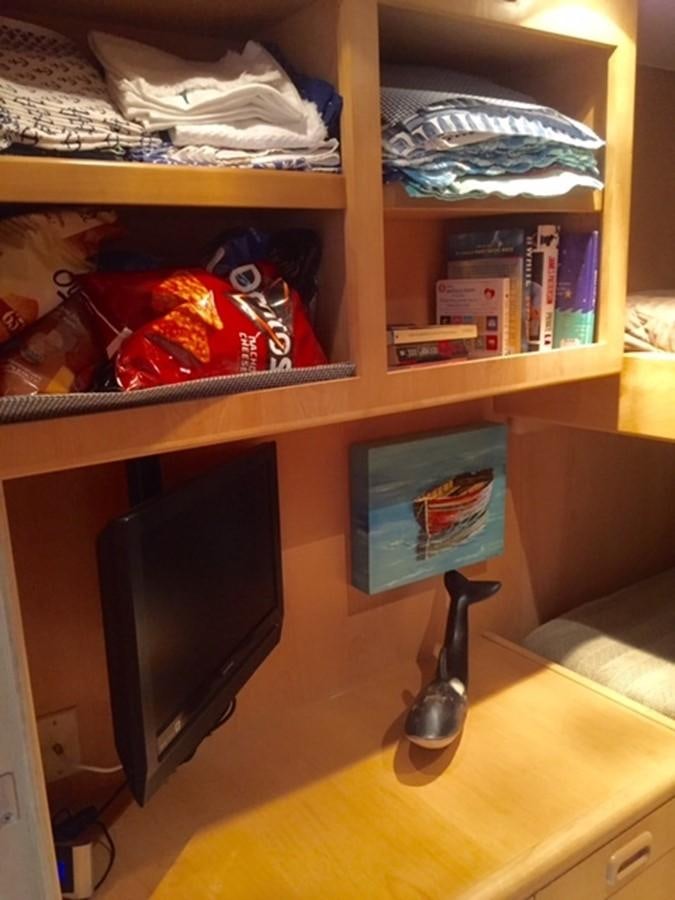 a tv on a shelf aboard WHALE'S WAY Yacht for Sale